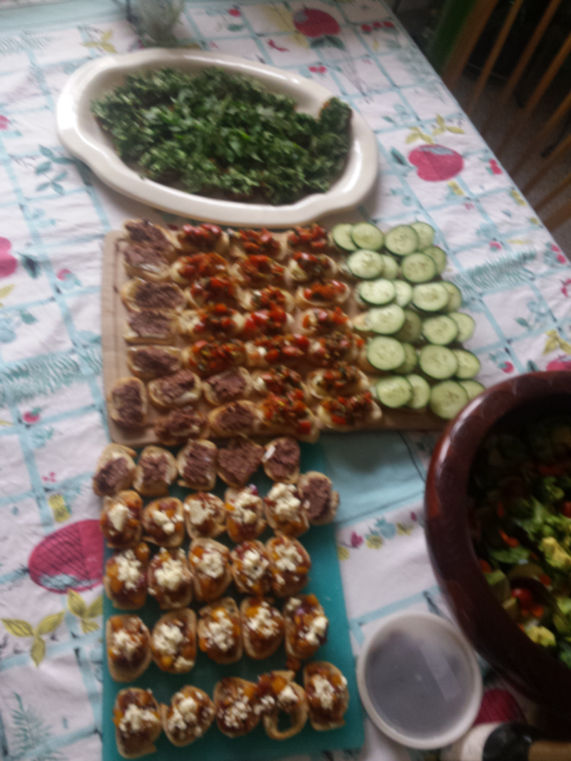 Sorry... blurry. The latke cupcakes are all the way at the back of the table. The other crostinis are in the foreground.
